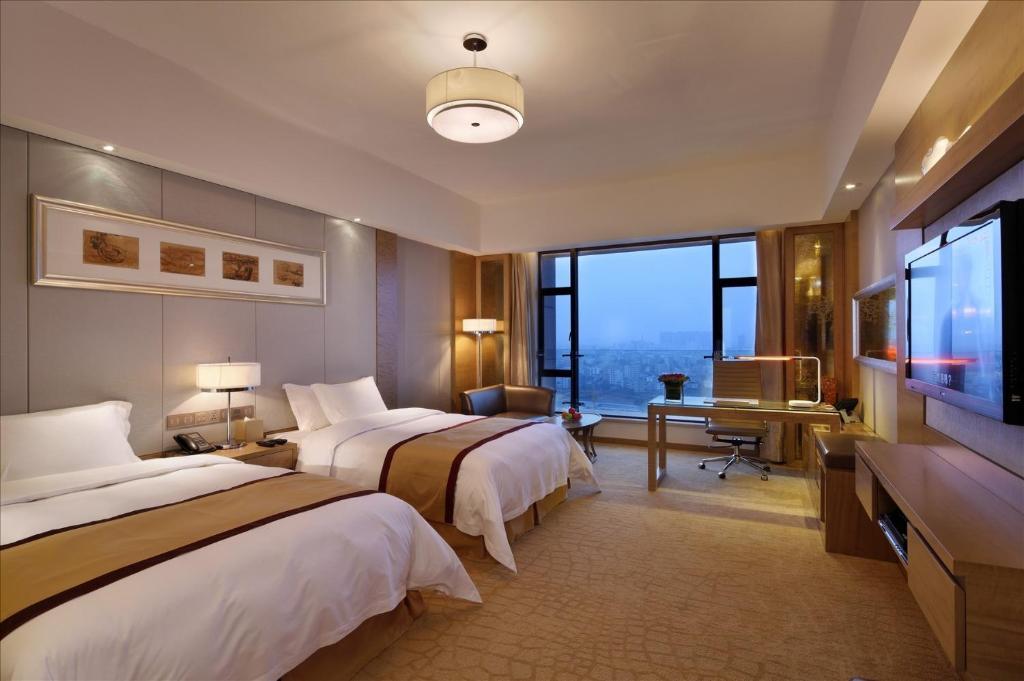 Sovereign Hotel Zhanjiang Værelse billede